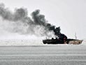У берегов Испании спасены наркоторговцы, пытавшиеся сжечь на судне 18 тонн гашиша У берегов Испании спасены наркоторговцы, пытавшиеся сжечь на судне 18 тонн гашиша