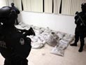 В аэропорту Мехико изъята 1 тонна "черного кокаина" В аэропорту Мехико изъята 1 тонна "черного кокаина"