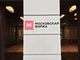 Акции сотовых операторов упали после подписания Путиным пакета "антитеррористических законов"