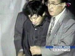 Член секты "Аум Синрике" Кузуаки Оказаки (Kazuaki Okazaki), кадр телеканала "Россия"