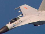     J-11,      P-8 Poseidon 19  2014 
